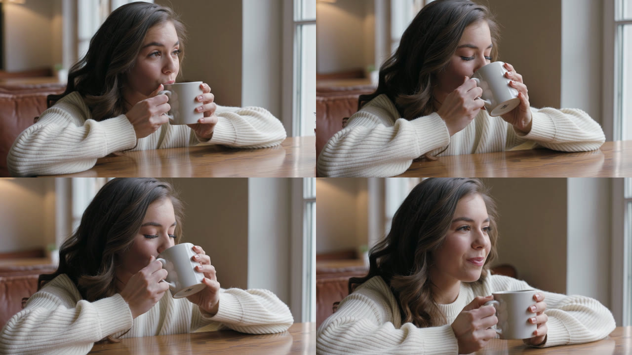 Prompt 2 frames: a young woman in a cream knit sweater sips from a white mug at a window table and smiles